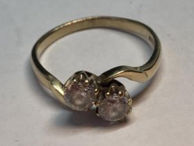 A 9 CARAT GOLD RING WITH TWO CUBIC ZIRCONIAS SIZE J