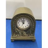 AN ITALIAN CLASSICAL BRASS MANTLE CLOCK WITH CHERUB DESIGN HEIGHT 12CM