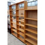 A FOURTEEN DIVISION OPEN BOOKCASE 53" WIDE