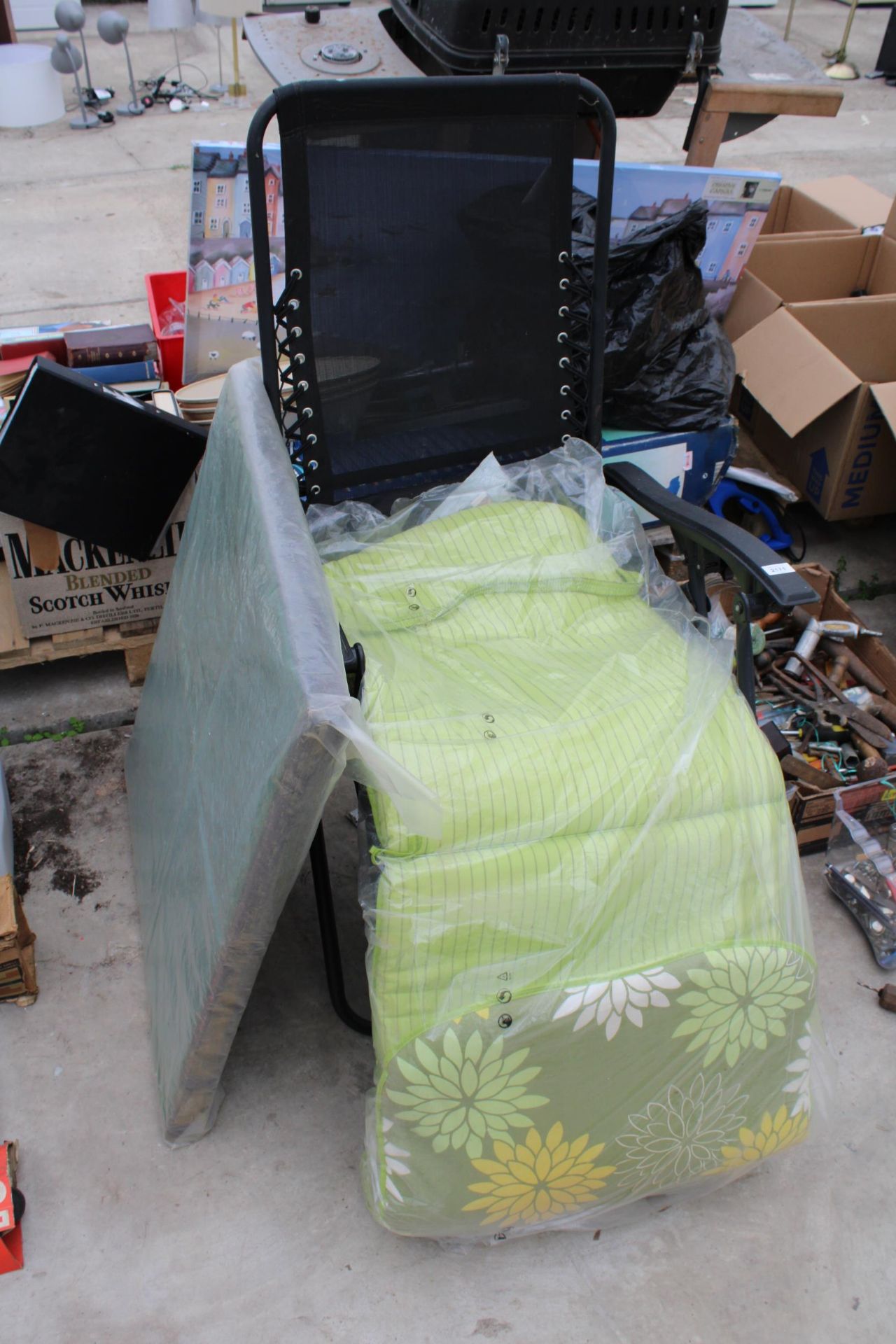 A FOLDING GARDEN LOUNGER AND A CARD TABLE