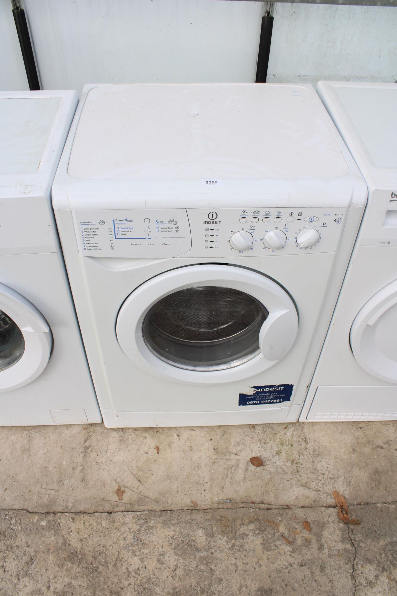 A WHITE INDESIT 4KG WASHING MACHINE