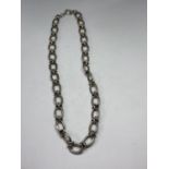 A HEAVY SILVER NECK CHAIN