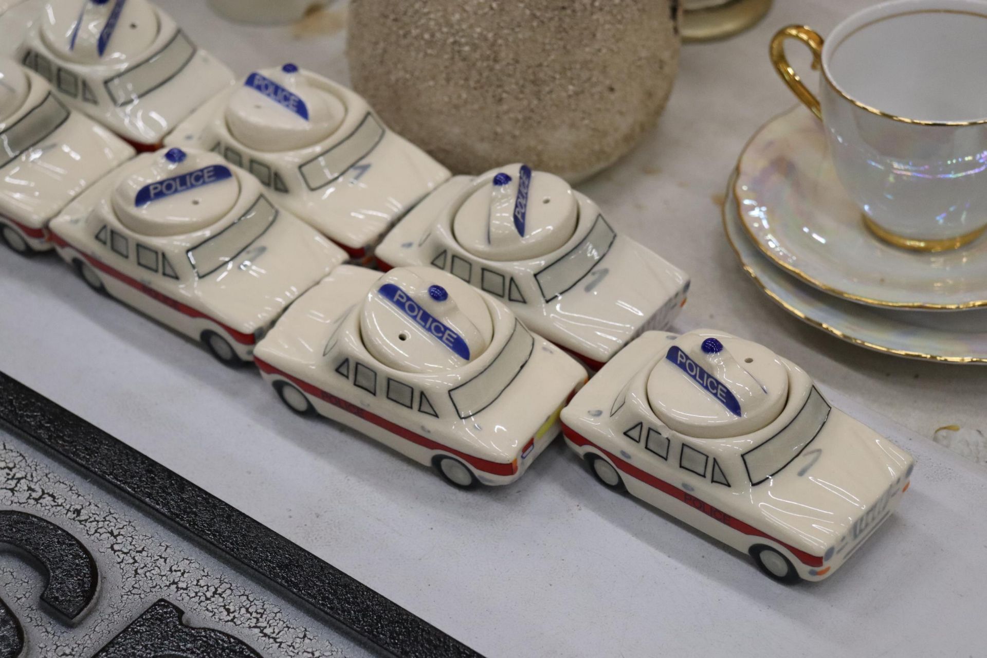 THIRTEEN POLICE CAR EGG CUPS WITH SALT POT FOR LID - Image 2 of 6