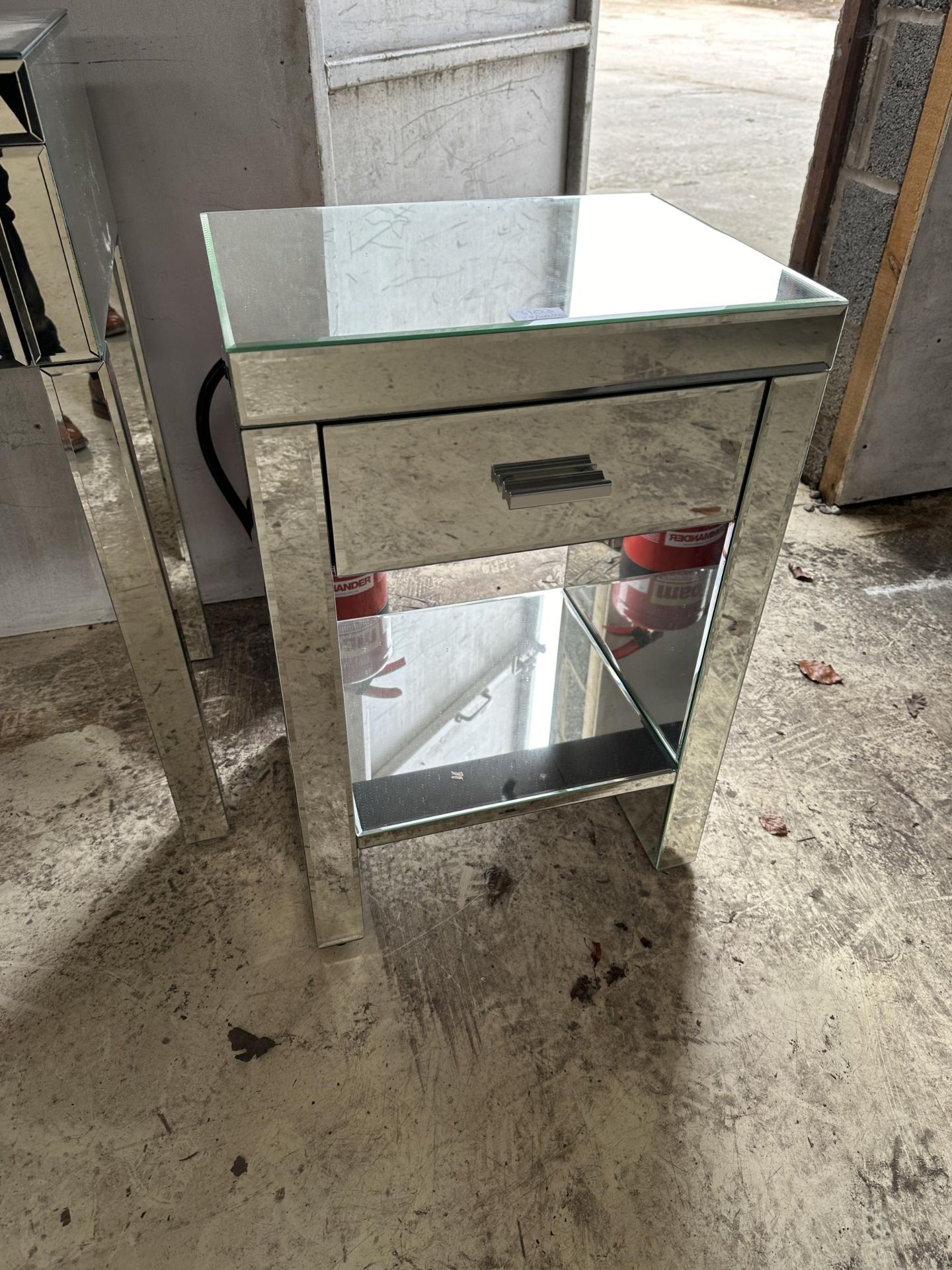 A MIRRORED BEDSIDE CABINET WITH SINGLE DRAWER (FROM A DEVELOPER'S SHOW HOME - BELIEVED UNUSED)