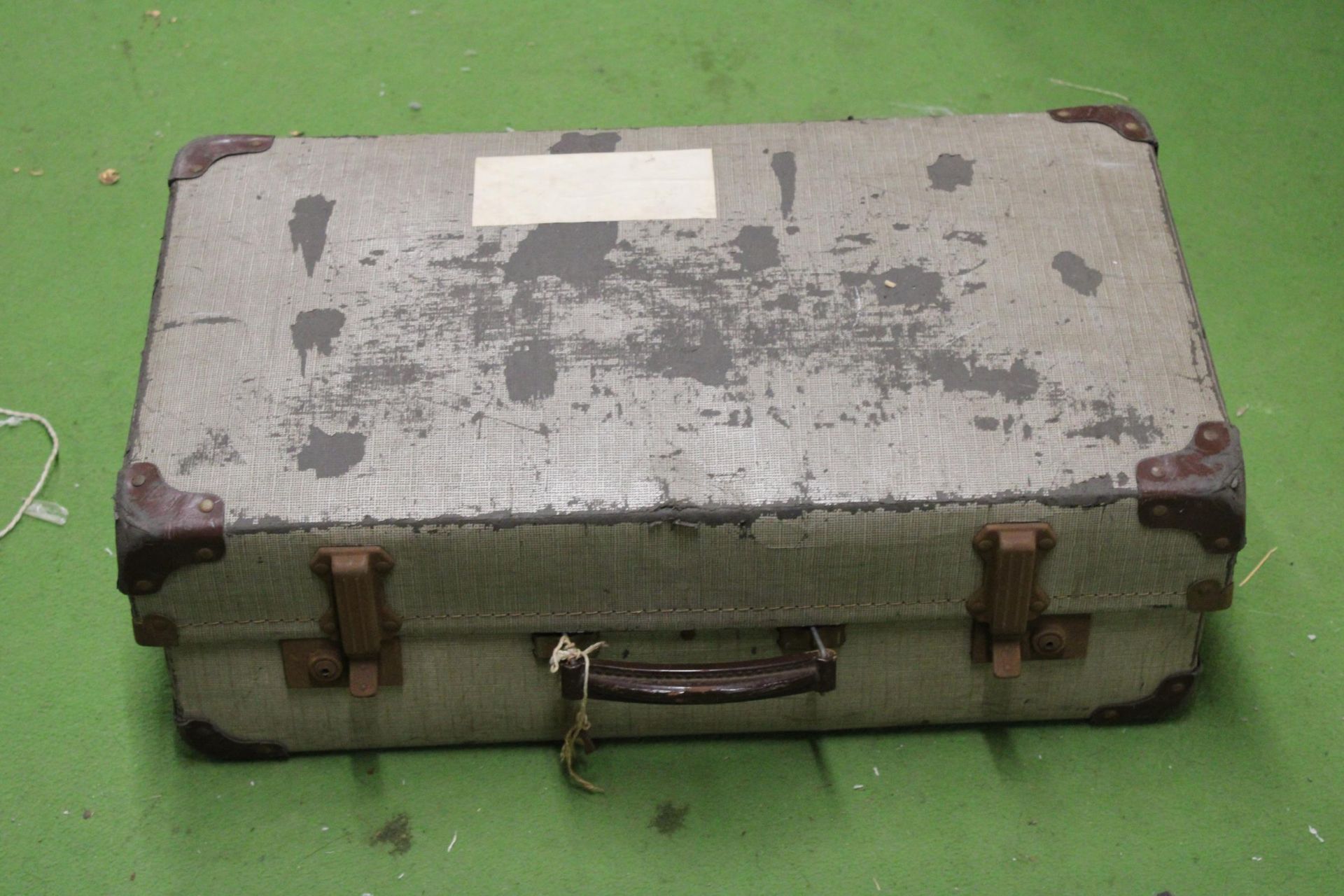 A VINTAGE SUITCASE