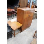 AN ART DECO WALNUT TWO DOOR WARDROBE 38" WIDE AND AN OCCASIONAL TABLE