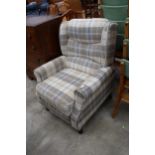 A MODERN CHECK RECLINER CHAIR