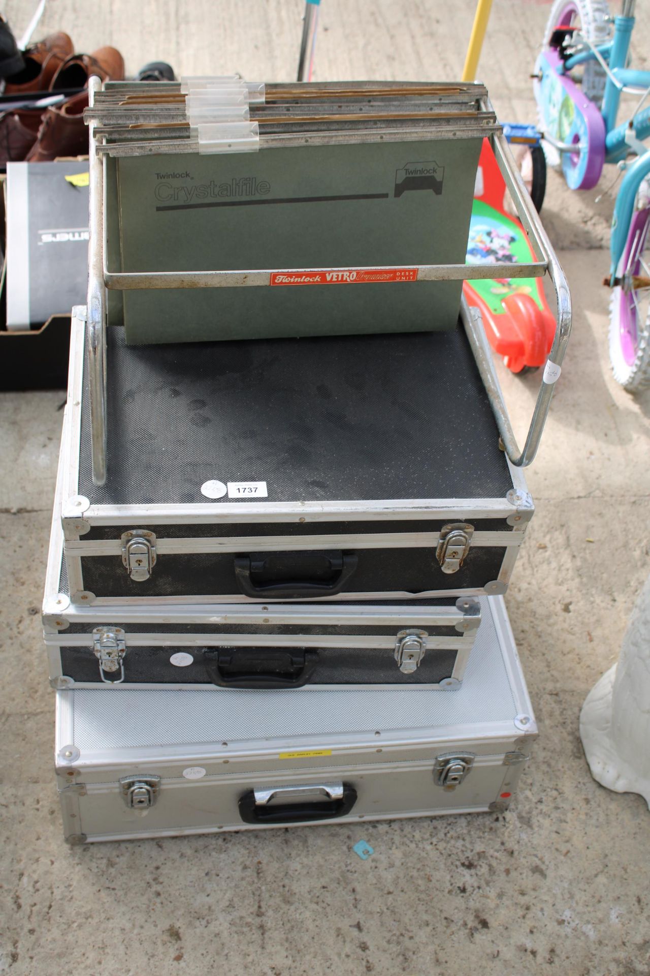 THREE HARD CARRY CASES AND A FILE RACK