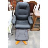 A FAUX BLACK LEATHER SWIVEL RECLINING CHAIR AND STOOL