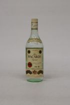 A 1L BOTTLE OF CARTA BLANCA RON SUPERIOR BACARDI