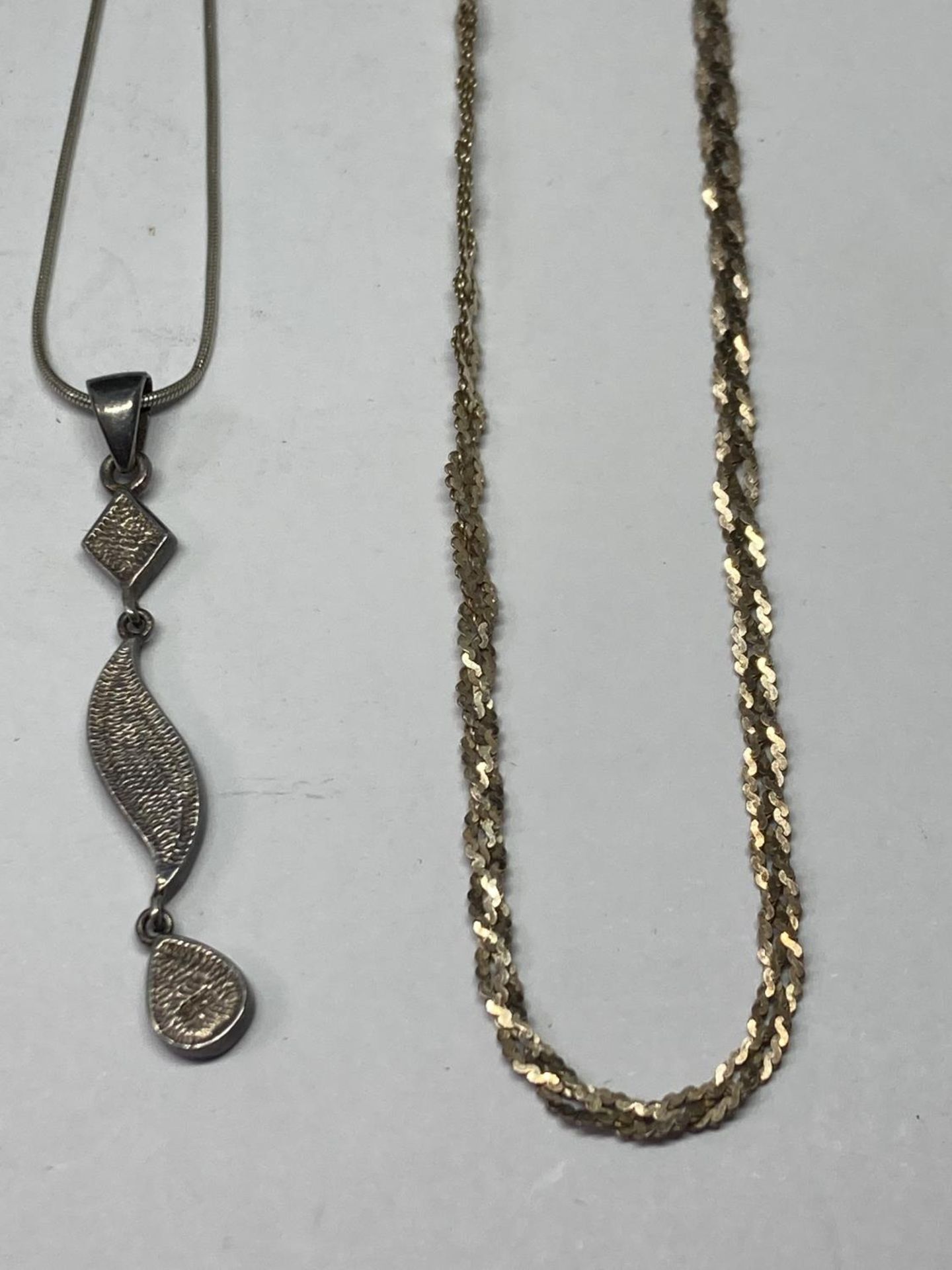 FOUR SILVER NECKLACES THREE WITH PENDANTS - Image 3 of 3