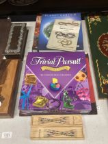 A MIXED LOT TO INCLUDE TRIVIAL PURSUIT AND MIKADO 'PICK UP STICKS' GAMES, BOOKS, ETC