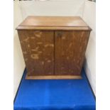 A WEBB AND SON PLYMOUTH EXETER OAK STATIONARY CABINET WITH THREE INTERIOR DRAWERS ENCLOSED WITH