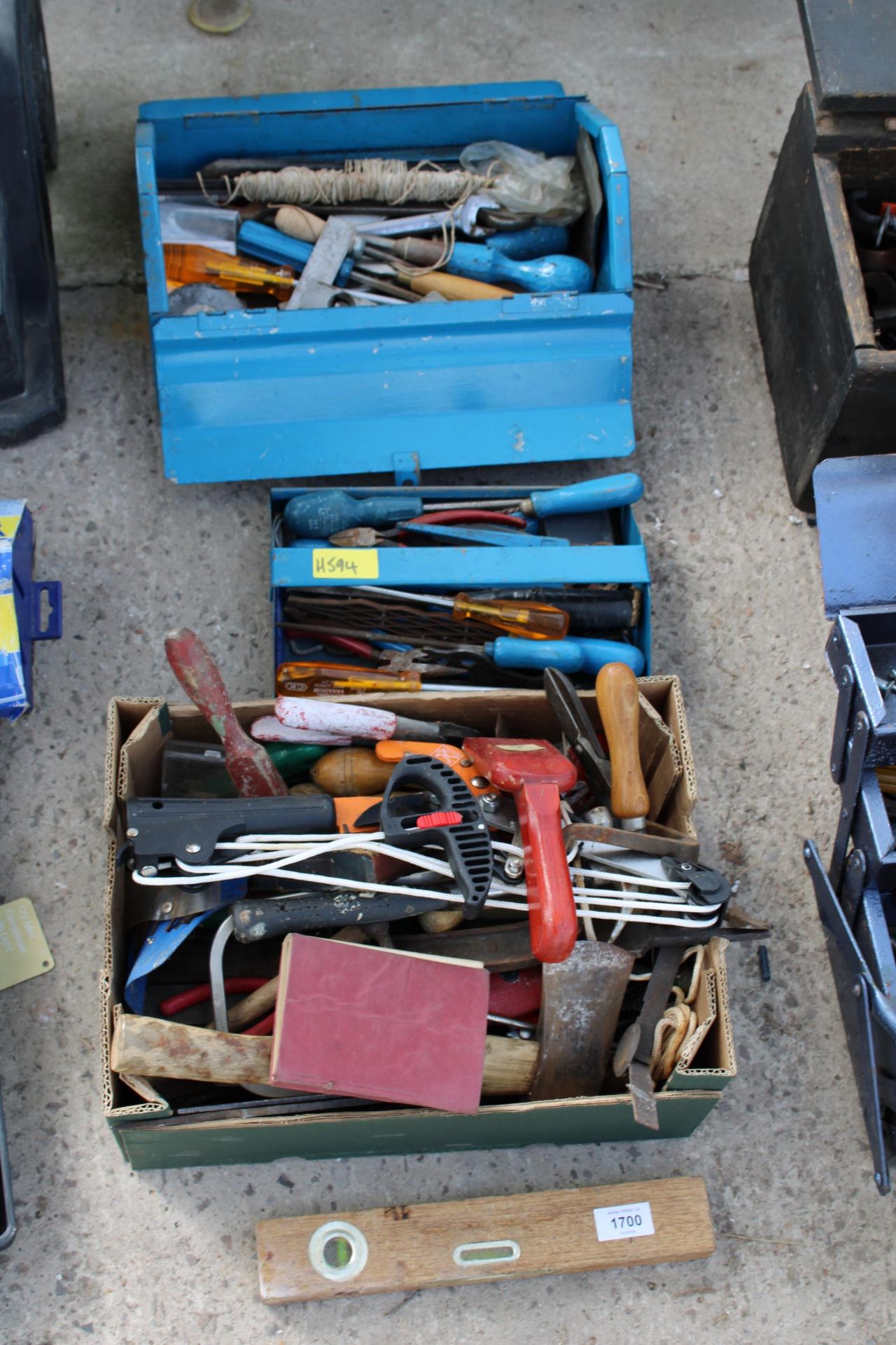 AN ASSORTMENT OF TOOLS TO INCLUDE SPANNERS AND AN AXE ETC