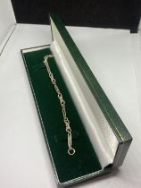 A SILVER BRACELET IN A PRESENTATION BOX