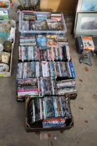 A LARGE ASSORTMENT OF DVDS