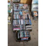 A LARGE ASSORTMENT OF DVDS