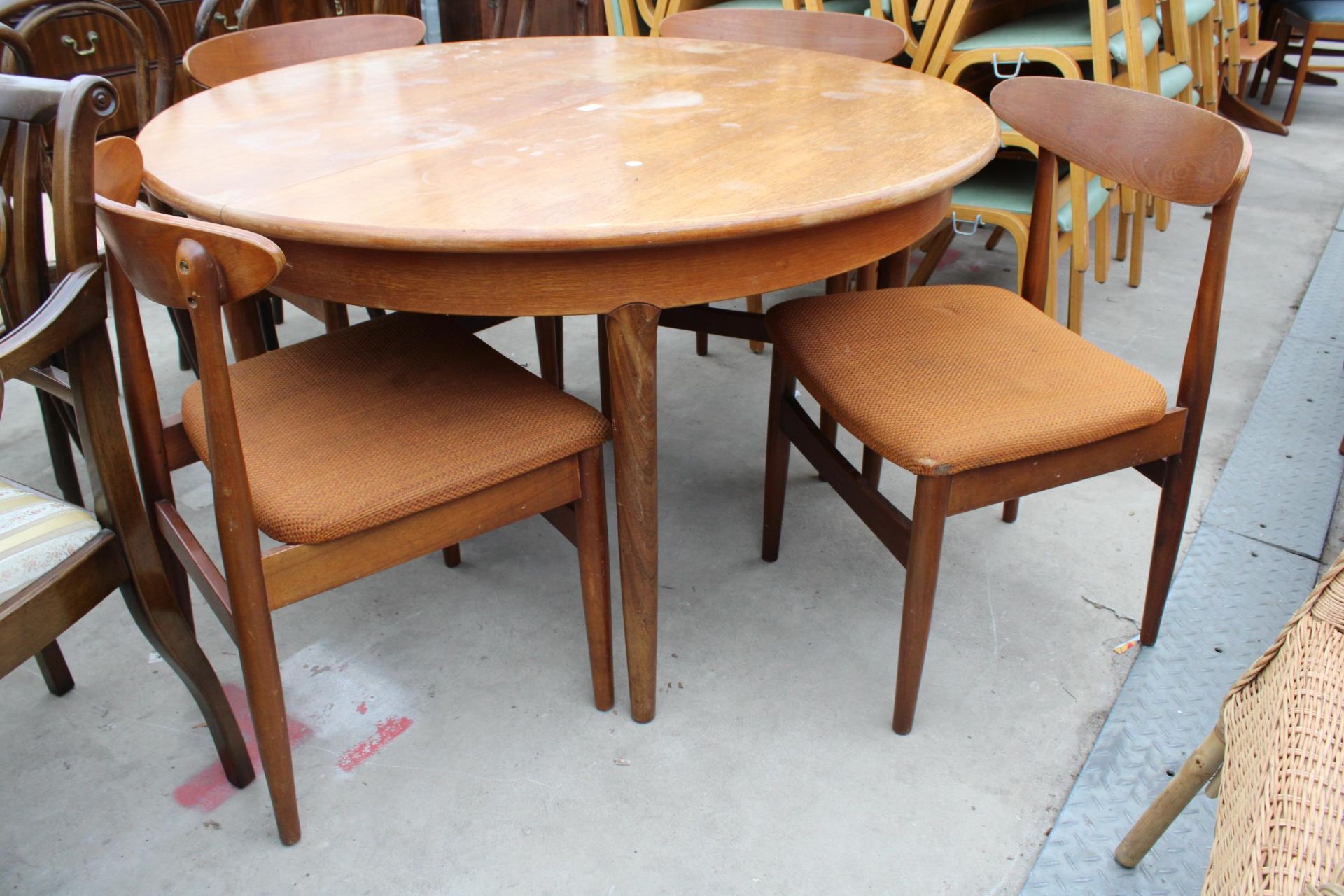 A RETRO TEAK EXTENDING DINING TABLE 48" DIAMETER (LEAF 18") AND FOUR CHAIRS - Image 2 of 2