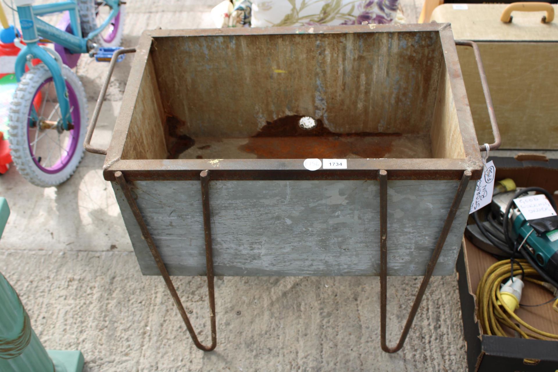 A METAL STORAGE BOX/TROUGH PLANTER WITH STAND