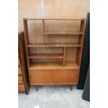 A RETRO TEAK CABINET WITH GEOMETRIC SHELVES AND TWO LOWER SLIDING DOORS