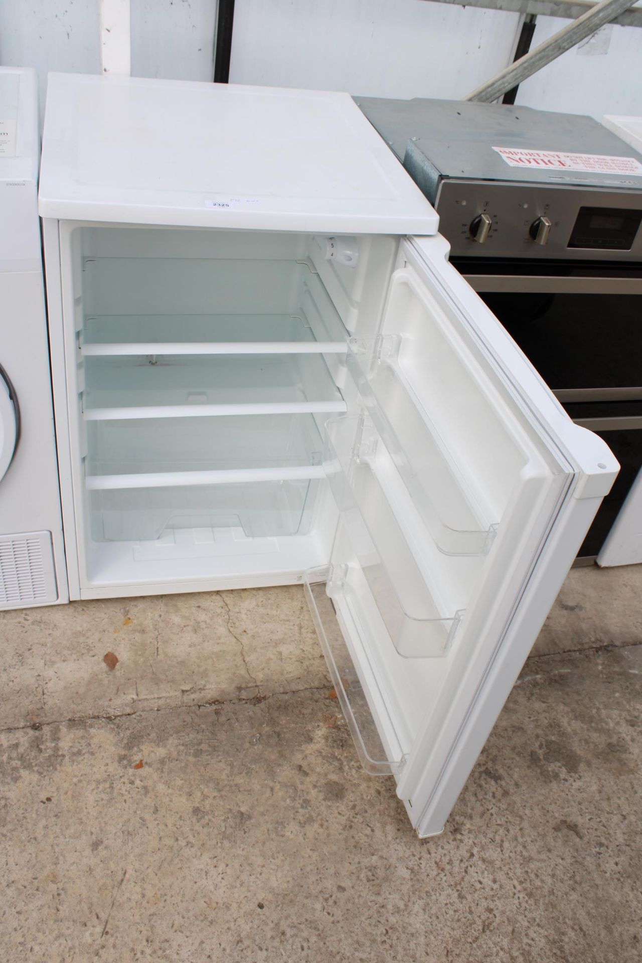 A WHITE UNDERCOUNTER FRIDGE BELIEVED IN WORKING ORDER BUT NO WARRANTY - Image 2 of 2