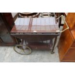 A RETRO DROP LEAF TROLLEY WITH TWO CART WHEELS AND BRASS FITTINGS