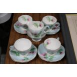 A FOLEY CHINA, 'GLENGARRY THISTLE' PART TEASET TO INCLUDE A SUGAR BOWL, CREAM JUG, CUPS AND SAUCERS