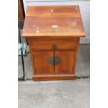 AN ORIENTAL STYLE HARDWOOD BEDSIDE LOCKER