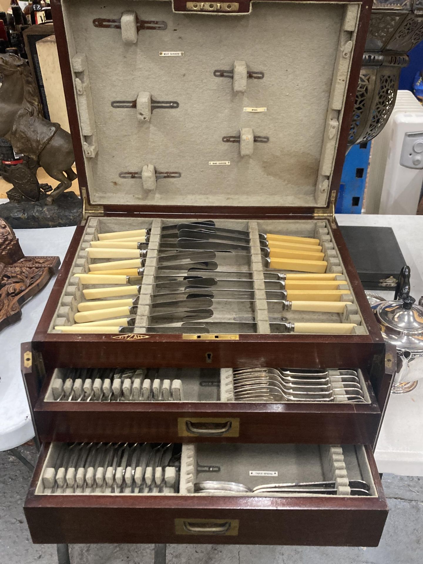 A FITZALL MAHOGANY CUTLERY BOX WITH LIFT UP LID AND TWO DRAWERS CONTAINING CUTLERY BUT NOT COMPLETE