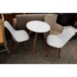 A WHITE MELAMINE TABLE ON KICK OUT LEGS 24" DIAMETER AND A PAIR OF SIMILAR CHAIRS