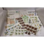 A COLLECTION OF BLOCKS OF STAMPS