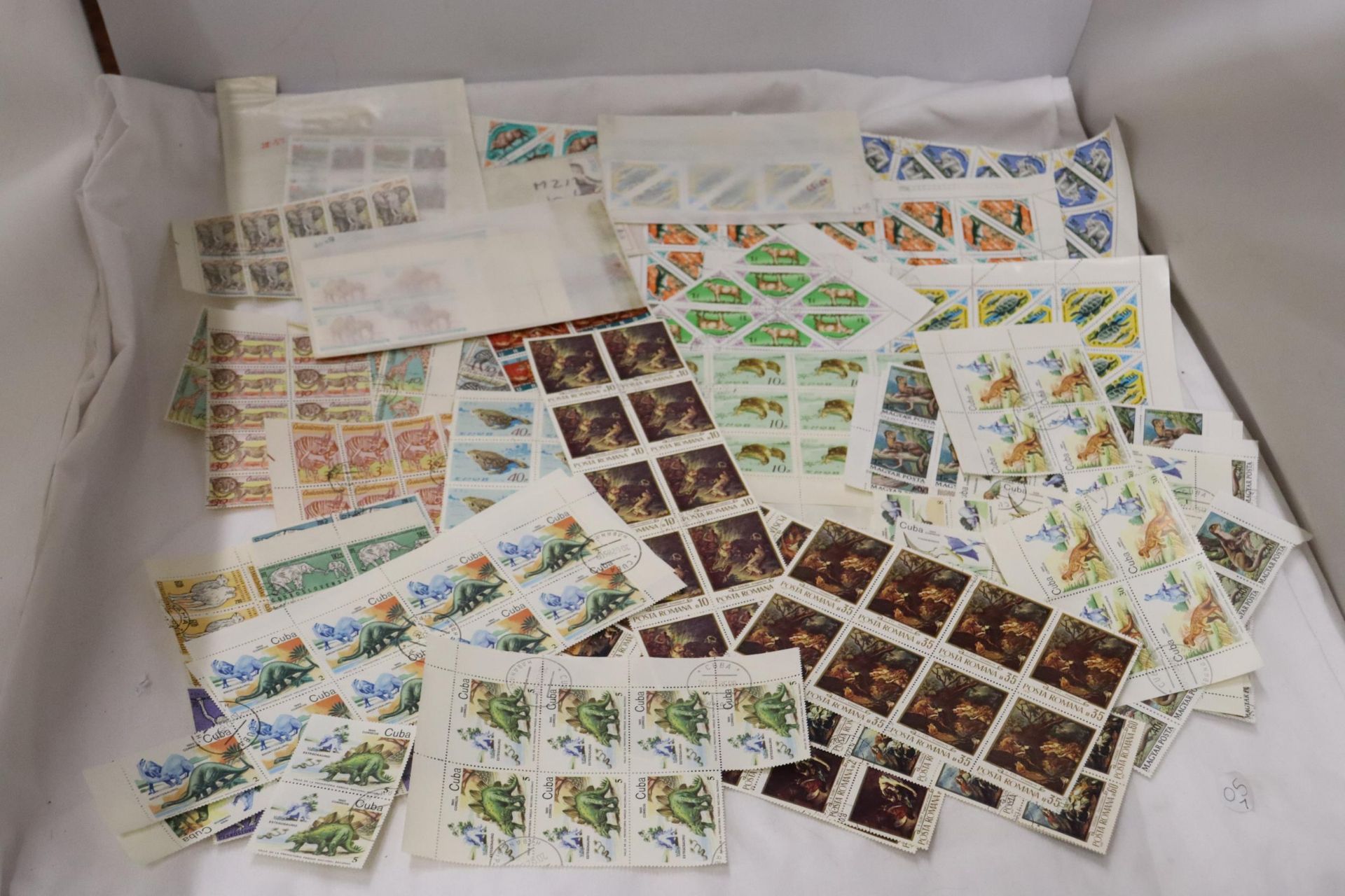 A COLLECTION OF BLOCKS OF STAMPS