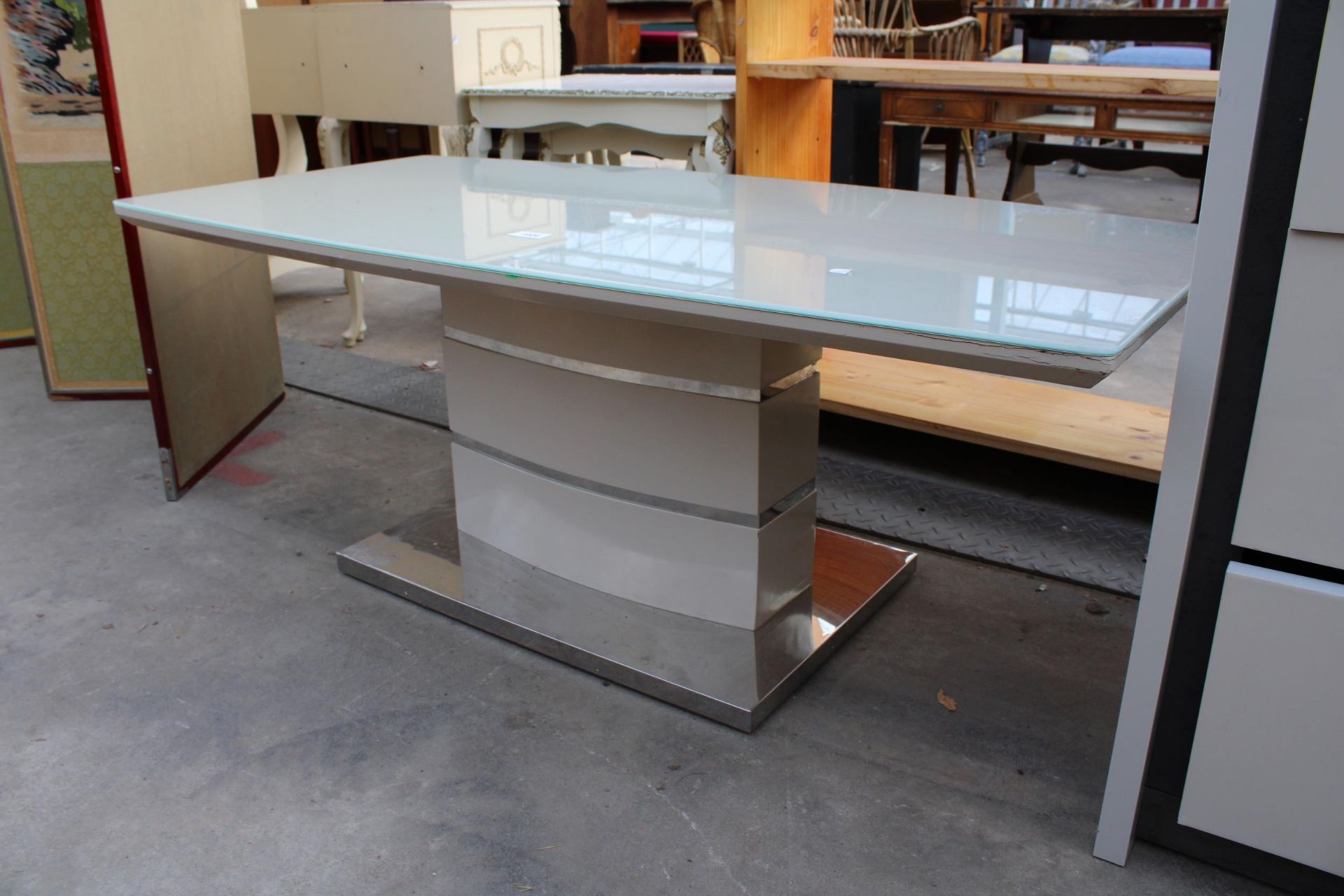 A MILAN STYLE COFFEE TABLE WITH GLASS TOP AND POLISHED CHROME BASE 47" X 24" - Image 2 of 2