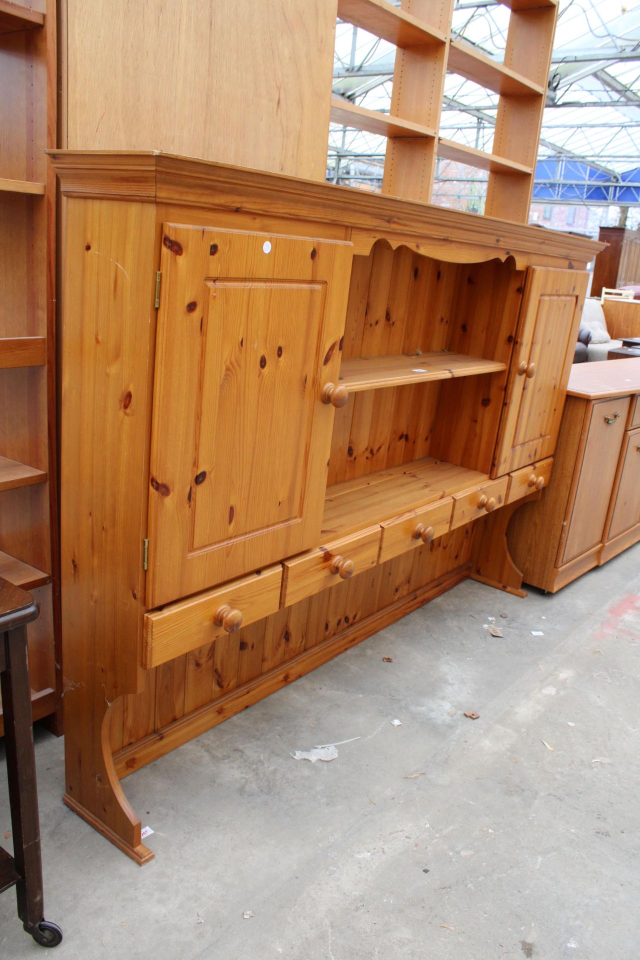 A PINE DRESSER RACK ENCLOSING CUPBARDS AND DRAWERS, 72" WIDE - Image 2 of 2