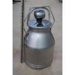 A STAINLESS STEEL FULLWOOD MILKING BUCKET WITH LID