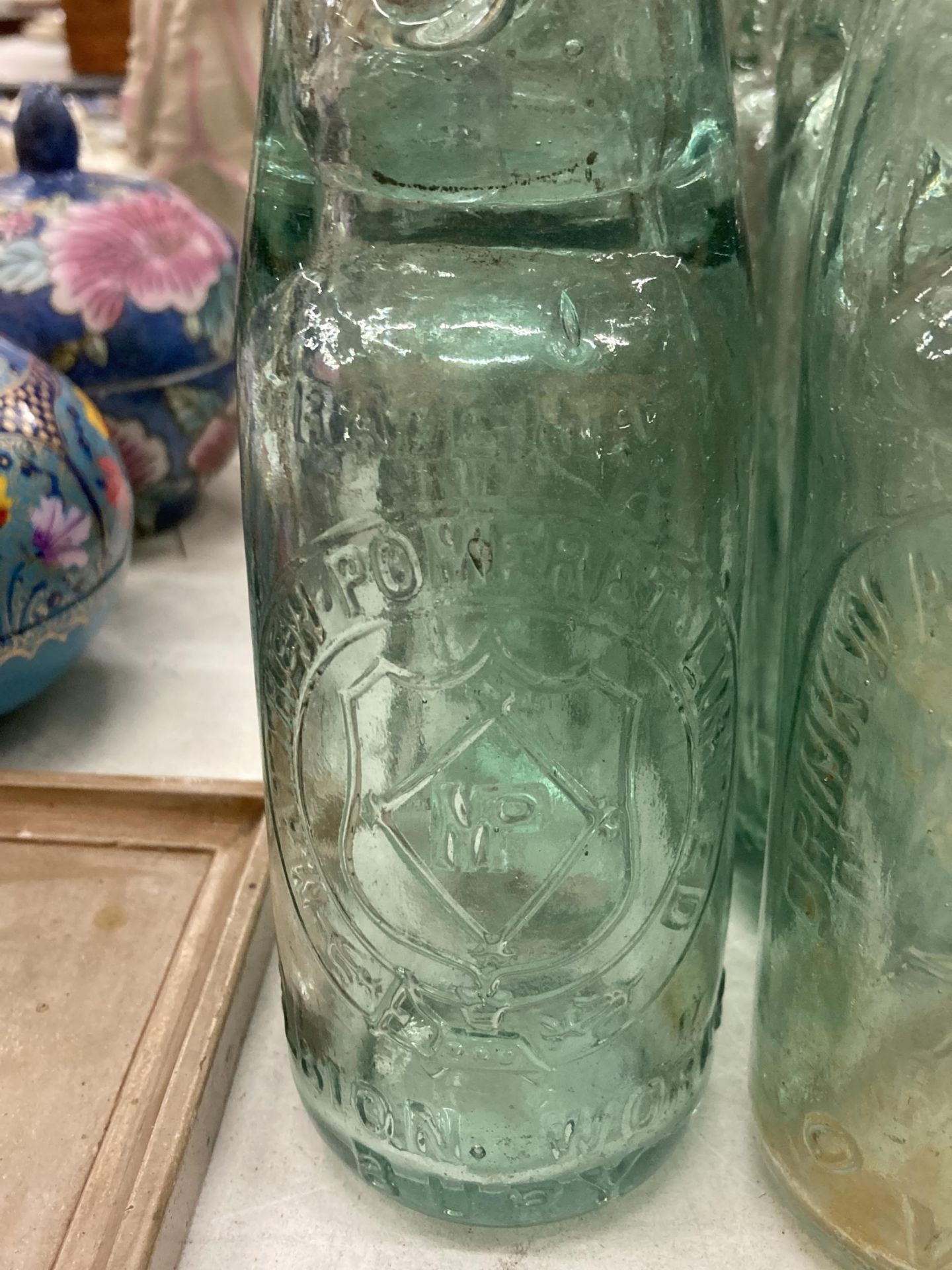 EIGHT GLASS CODD BOTTLES, WITH ADVERTISING TO THE FRONT AND GLASS MARBLE STOPPERS - Image 2 of 3