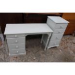 A PAINTED DRESSING TABLE AND FOUR DRAWER CHEST