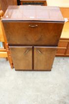 A MID 20TH CENTURY WALNUT COCKTAIL CABINET 24" WIDE