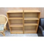 A PAIR OF OAK EFFECT THREE TIER OPEN BOOKSHELVES 24" WIDE EACH