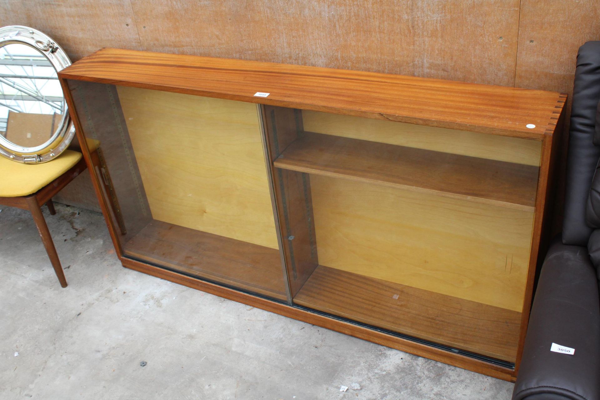 A RETRO TEAK BOOKCASE WITH TWO SLIDING DOORS 59" WIDE - Image 3 of 3