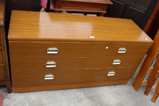 A RETRO TEAK EFFECT CHEST OF 6 DRAWERS 49" WIDE