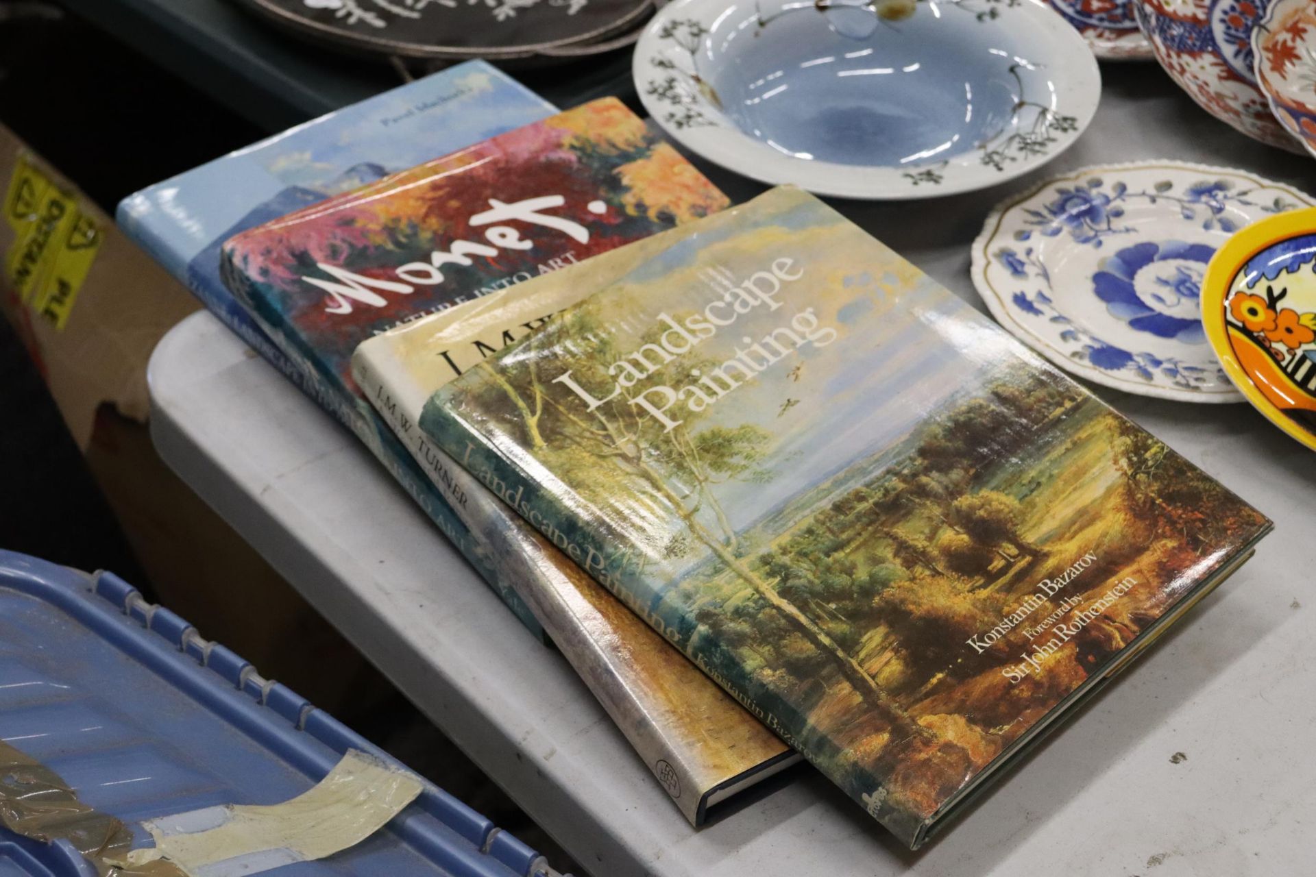 FOUR HARDBACK ART THEMED BOOKS TO INCLUDE LANDSCAPE PAINTING, J M W TURNER, MONET AND CEZANNE
