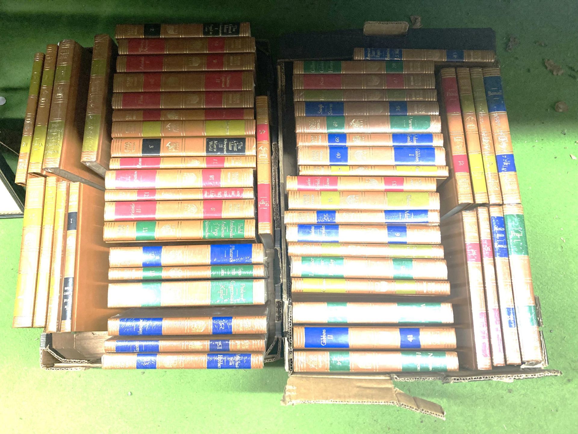 A FULL SET OF BRITANNICA GREAT HARDBACK BOOKS TO INCLUDE ARCHIMEDES, PLUTARCH, TOLSTOY AND MARX.