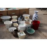 AN ASSORTMENT OF CERAMIC ITEMS TO INCLUDE PLANT POTS, A VASE AND JUGS ETC