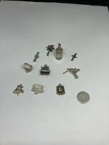 ELEVEN SILVER CHARMS