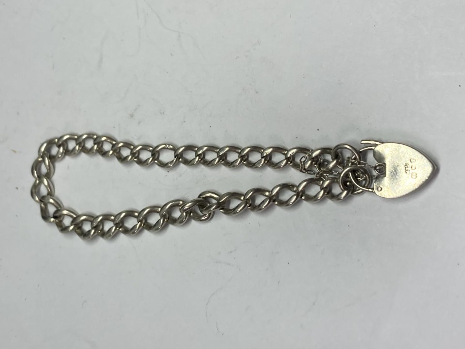 A SILVER WRIST CHAIN