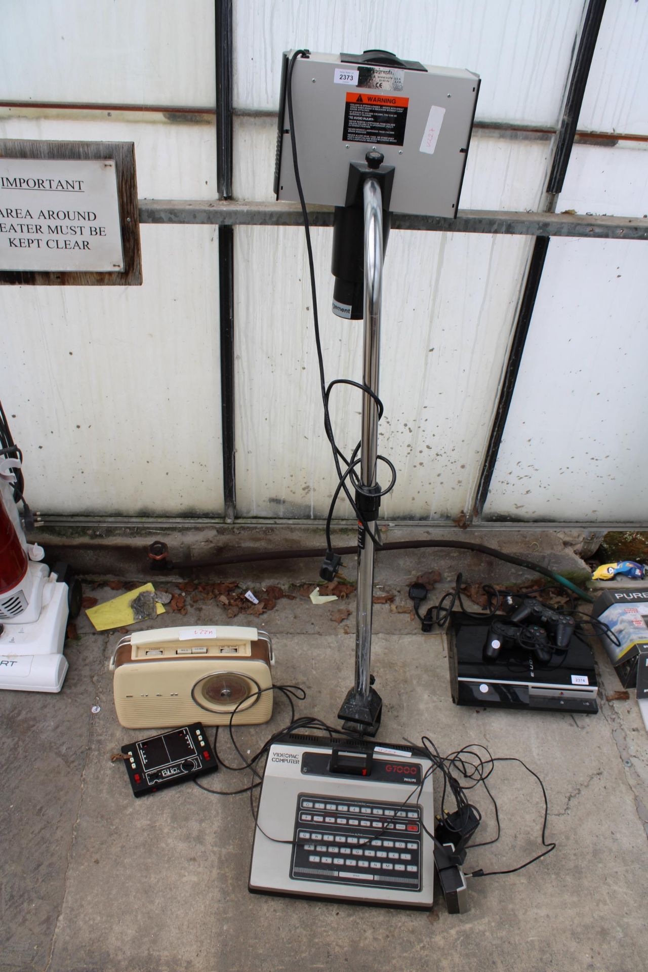 A VIDEO PAC COMPUTER G7000 AND A BUSH RADIO