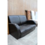 AN OTIUM (ITALY) LEATHER TWO SEATER SETTEE