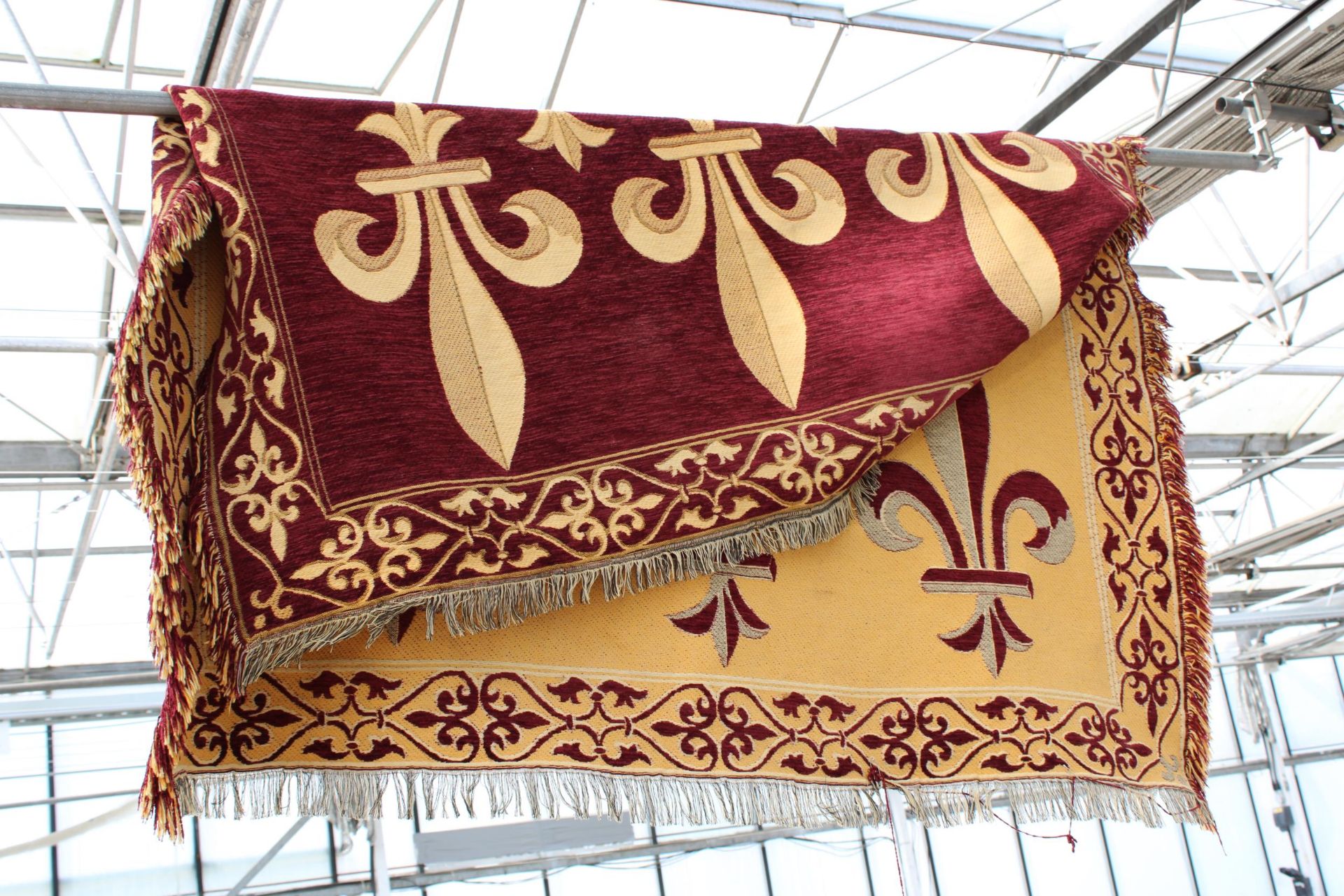 A RED PATTERNED FRINGED RUG - Image 2 of 2