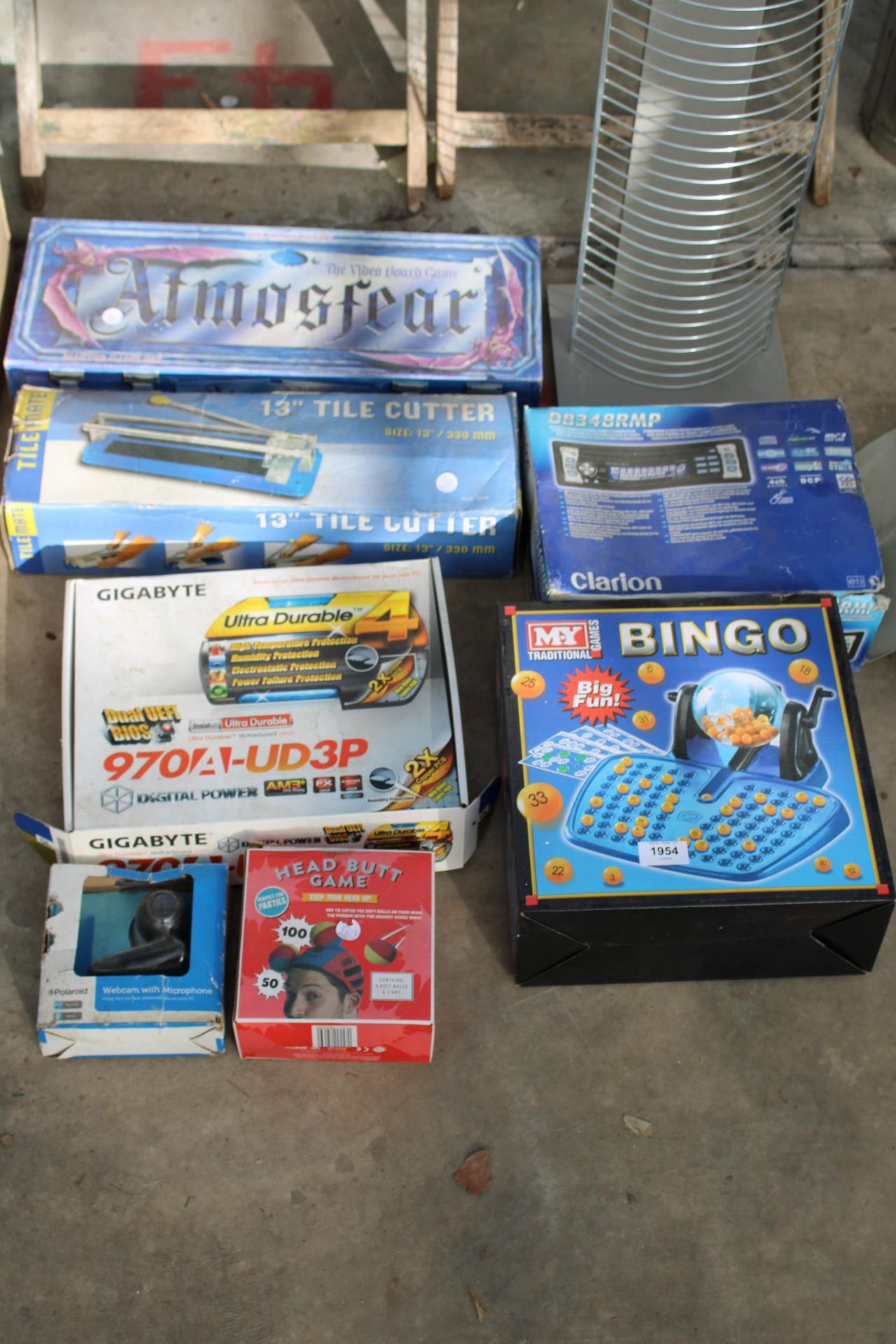 AN ASSORTMENT OF ITEMS TO INCLUDE A TILE CUTTER, A CD RACK AND BOARD GAMES ETC - Image 2 of 2